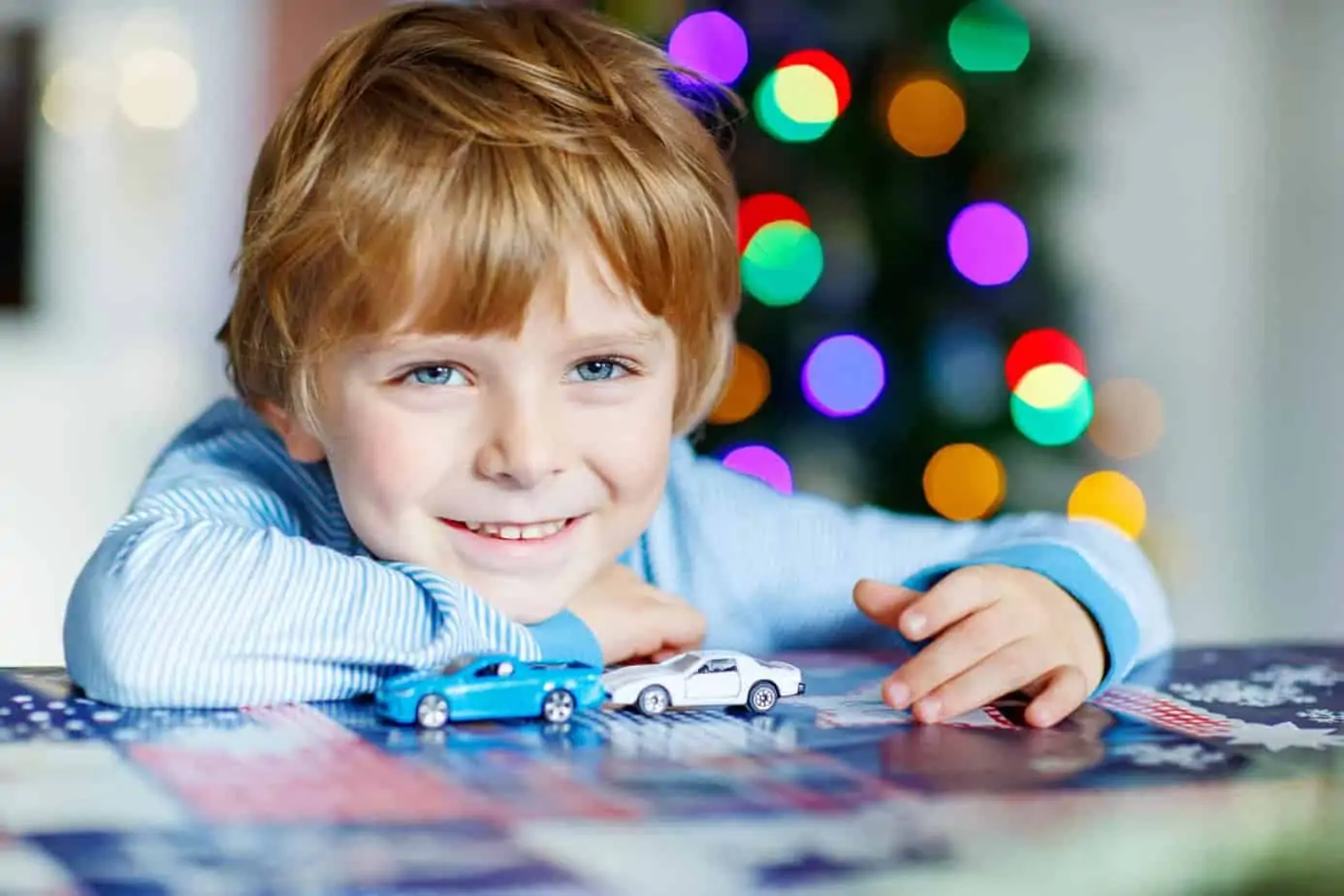 create a race track with tape and drive matchbox cards on the roads and cities that kids create as a great quiet busy playtime