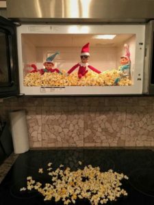 Elf on the Shelf making popcorn