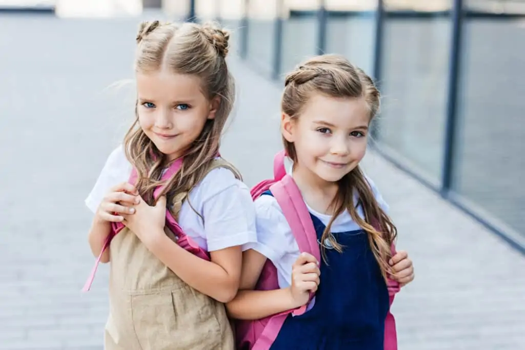 9 Easy ideas for organizing backpacks & creating a school gear drop zone, even if you don't have a mudroom or large space. Small organized space solutions.