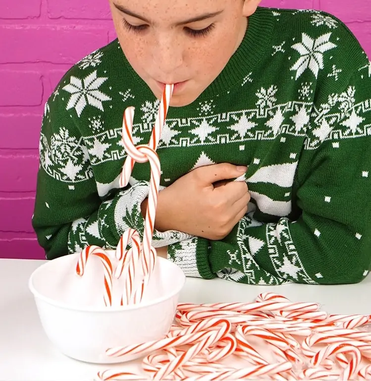 12 Best Minute to Win it Christmas Games for Kids & Adults. Hilarious games with minimal supplies, but silliness and laughter guaranteed! 