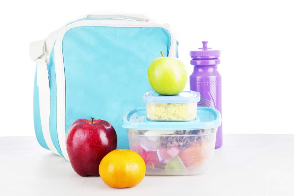 Get your kids to pack their own lunch with a simple lunch packing station that takes all the work and frustration out of making lunch for school. Plus good lunch box snack ideas to get you on your way. 